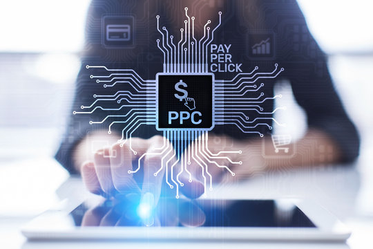 Business professional using tablet for PPC services in Hyderabad